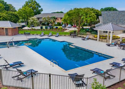 Outdoor Pool Area With Chairs